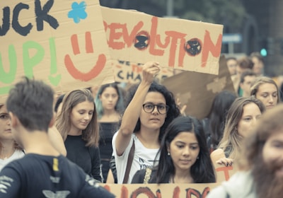 Protestors holding signs